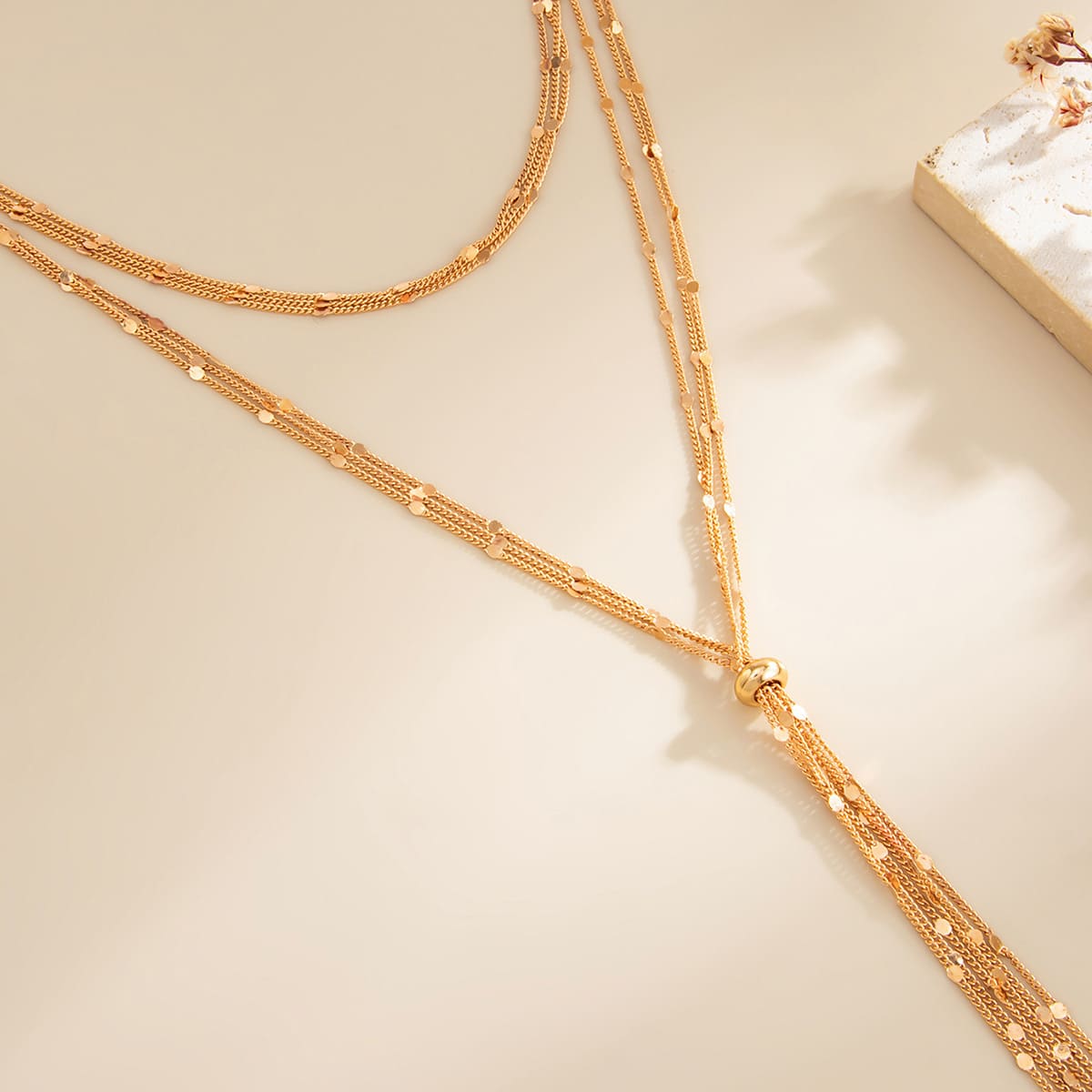 With a y-shaped long tassel pendant, this long chain statement necklace can perfectly show a sexy and feminine style. Matching this long statement necklace for women with a sexy V-neck dress will be a wonderful and perfect choice!