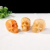 Orange Calcite Skull Gem Carvings Halloween Decor