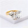Two-Stone Ring with Emerald Cut and Pear Cut Moissanite